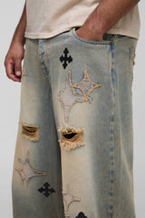 Plus Distressed Applique Tinted Baggy Fit Jeans