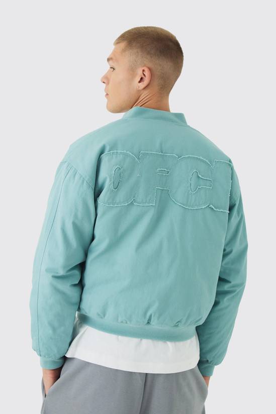 Boxy OFCL Applique Twill Padded Bomber Jacket In Light Blue