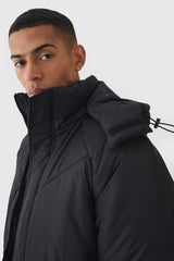 Boxy Quilted Hooded Puffer Coat In Black