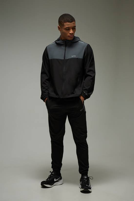 Man Active Colour Block Regular Fit Woven Tracksuit