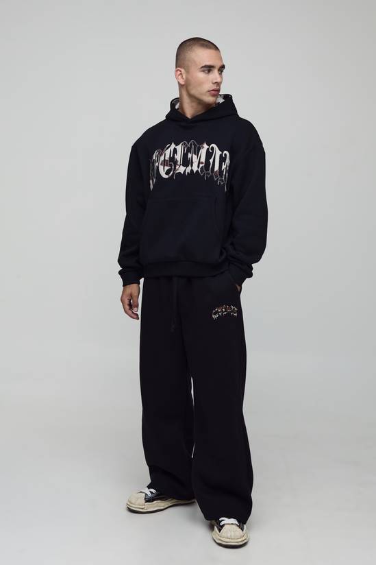 Oversized Boxy Ofcl Cow Print Applique Hoodie
